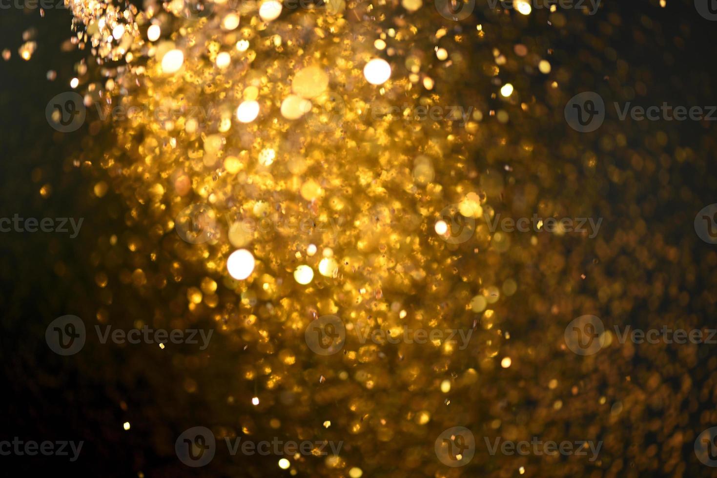 golden glitter bokeh illuminazione texture sfocato sfondo astratto per compleanno, anniversario, matrimonio, capodanno o natale foto