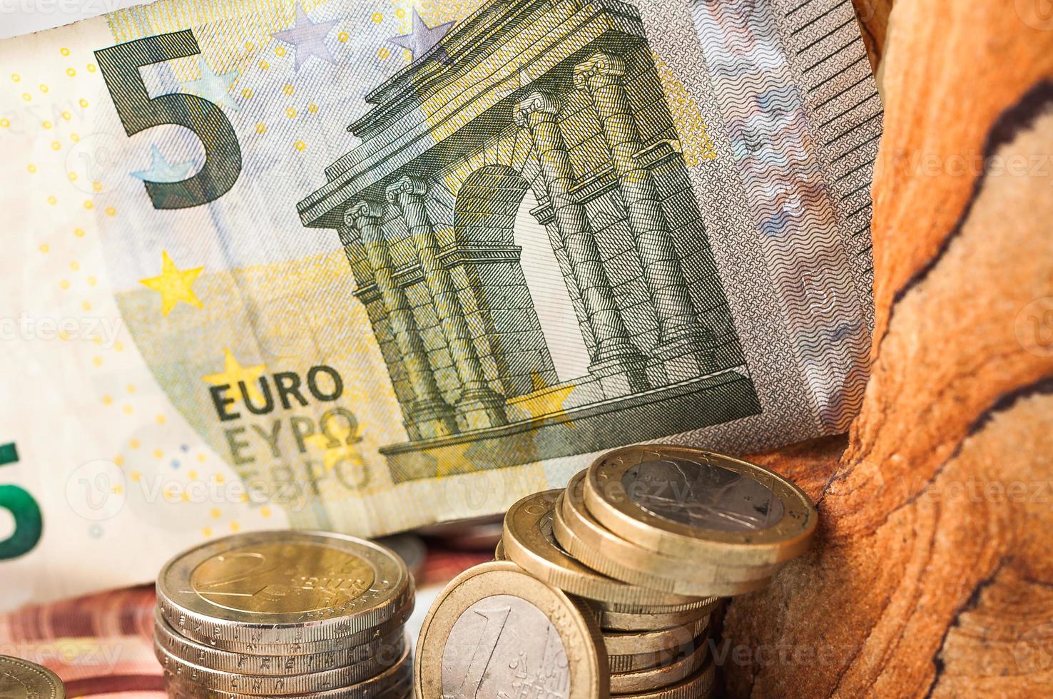 soldi cinque euro fattura e monete foto