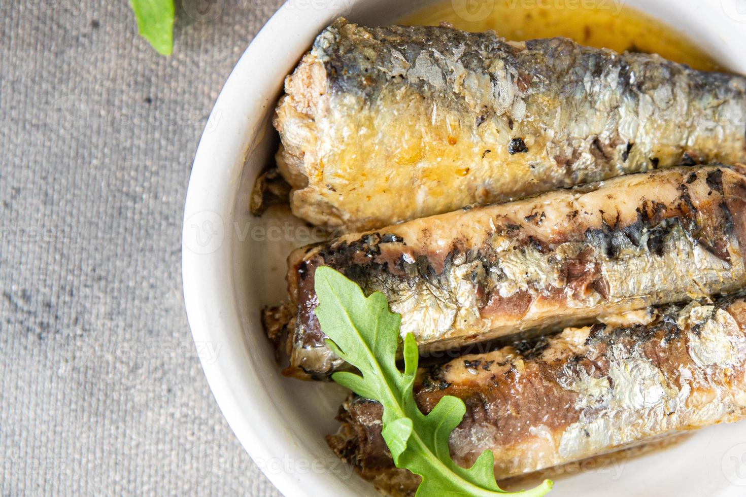 sardine pesce in scatola frutti di mare fresco pasto sano cibo spuntino dieta sul tavolo copia spazio cibo sfondo rustico vista dall'alto cibo vegetariano foto