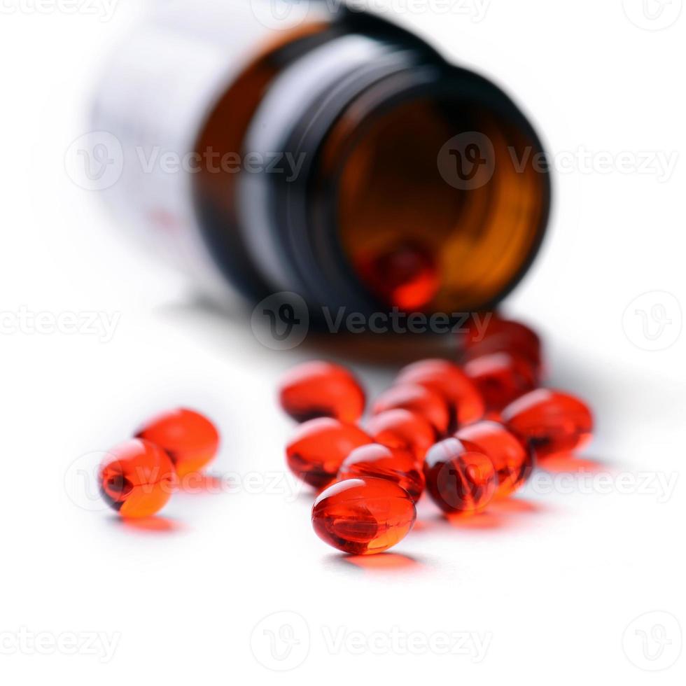 pillole in bottiglia di pillola su sfondo bianco foto