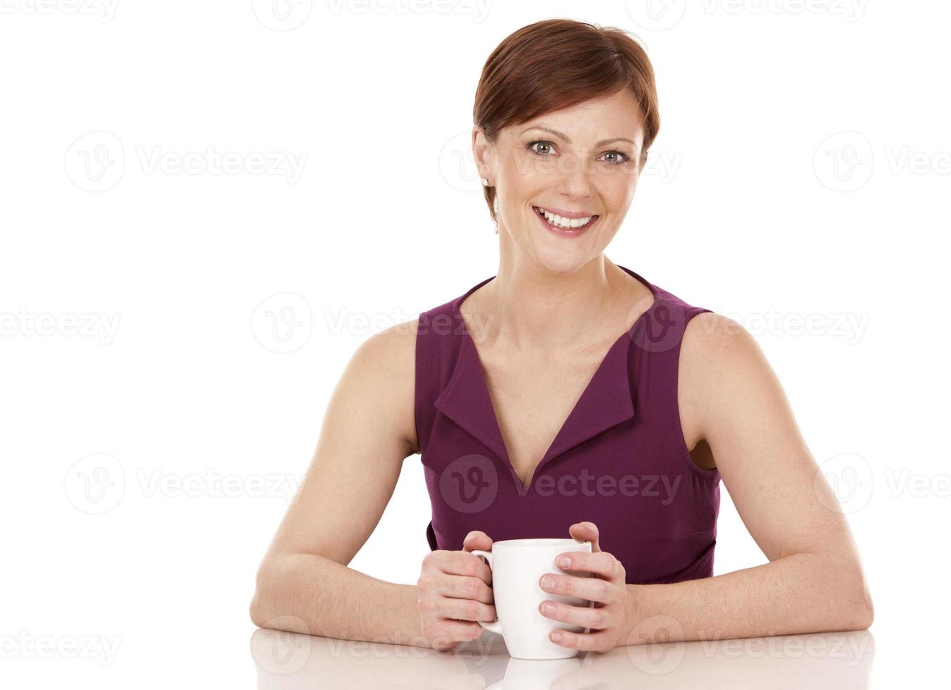donna che beve il caffè foto