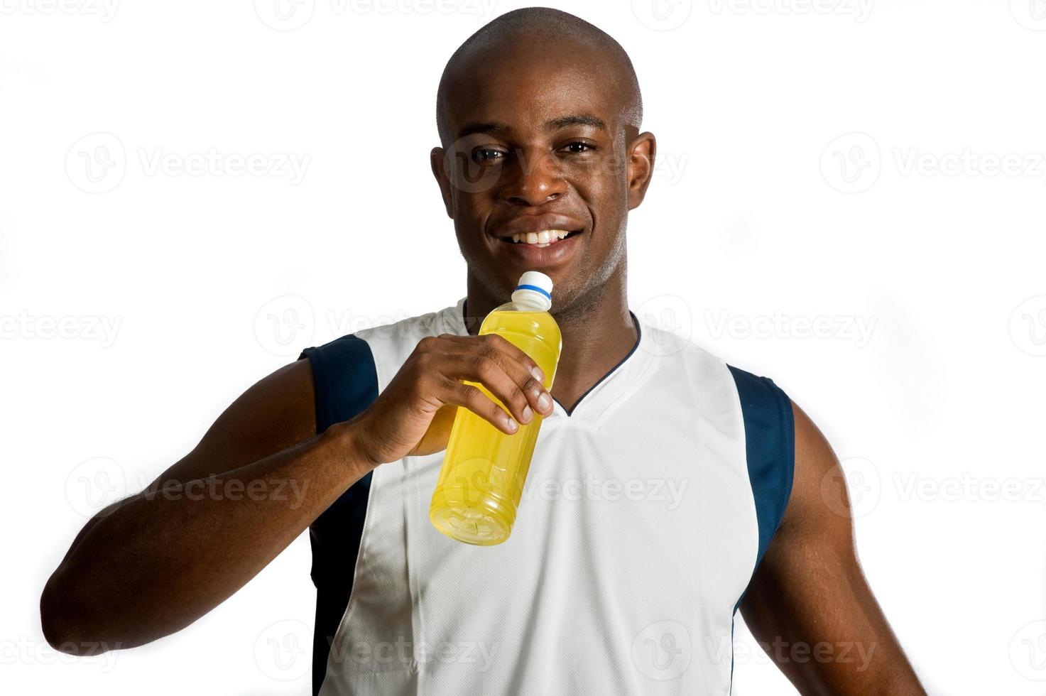 atleta con bevanda energetica foto