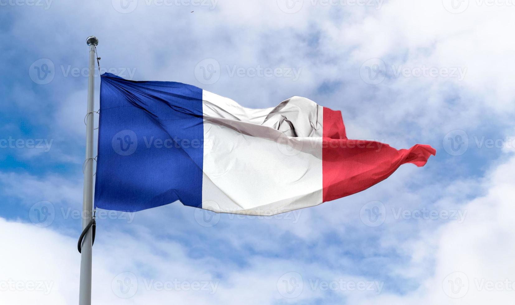 bandiera della francia - bandiera sventolante realistica in tessuto. foto