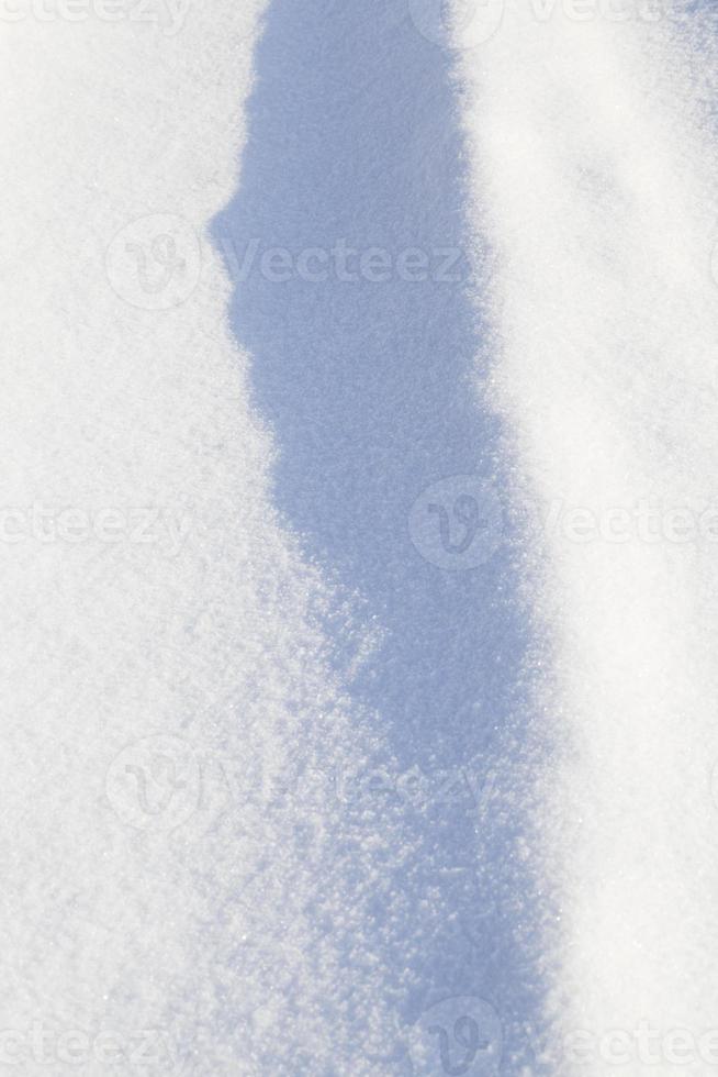 luce solare che illumina la neve foto