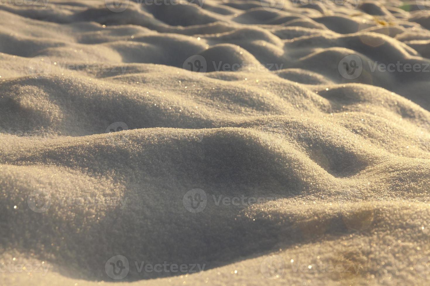 primo piano della superficie ruvida innevata foto