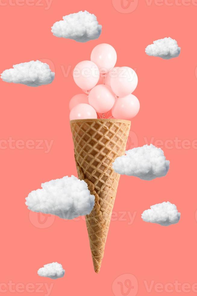 palloncini rosa che volano da un cono gelato su sfondo rosa. le nuvole volano via. concetto estivo creativo. gelato con palloncini creativi foto