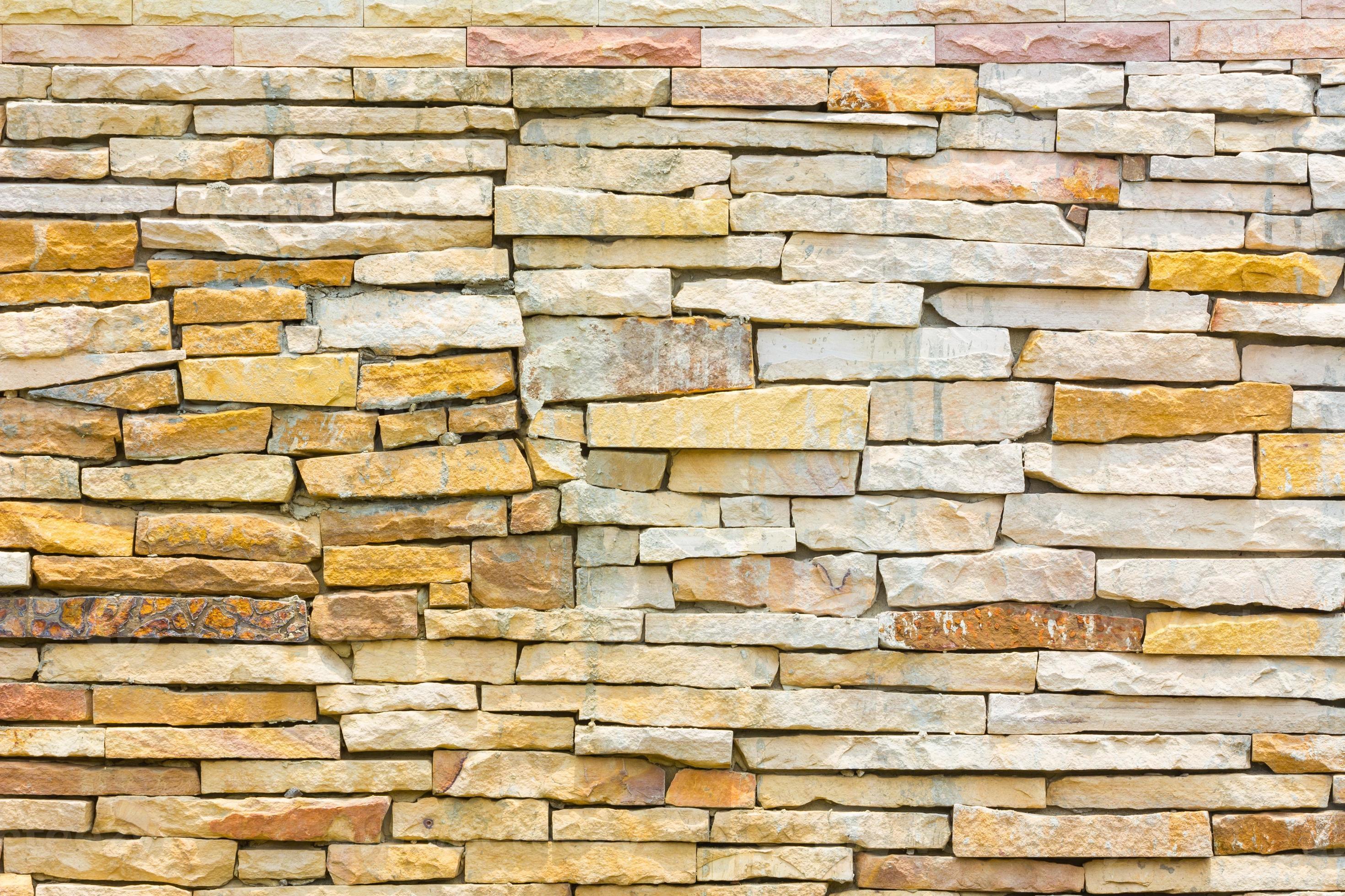 muro di mattoni disordinato o irregolare, sfondo texture foto
