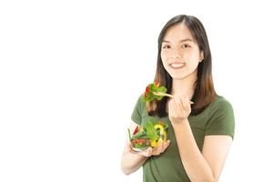 signora felice che tiene roba kichen sopra lo sfondo dello spazio della copia - concetto di preparazione del cibo fatto in casa della gente foto