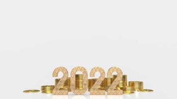 il numero d'oro 2022 e le monete d'oro su sfondo bianco per il rendering 3d del concetto di business o di Capodanno foto