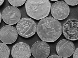 monete della sterlina, regno unito in bianco e nero foto