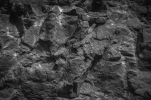 fondo di struttura della parete della roccia di pietra foto