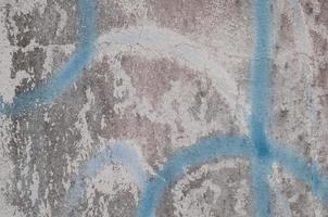 colore spray astratto sulla struttura della parete sporca foto
