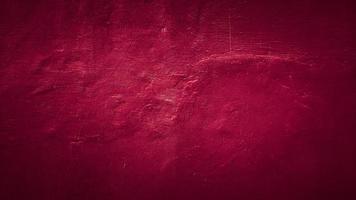fondo di struttura del muro di cemento astratto grungy rosso scuro foto