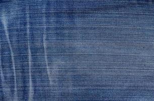 fondo di struttura del denim dei jeans blu foto