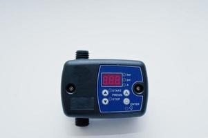 pressostato pompa acqua controller pompa flusso automatico interruttore elettronico. foto