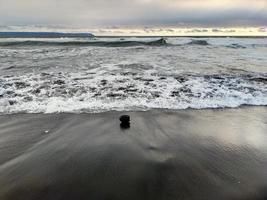 spiaggia il sole ha tramontato il relax dell'oceano foto