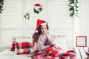 bellissimo femmina modello nel Santa cappello foto