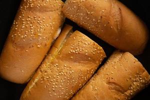 affettato panini, con d'oro pane e sesamo semi foto