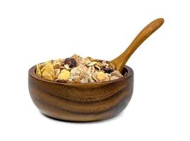 muesli Multi frutta nel di legno ciotola e cucchiaio isolato su bianca sfondo foto