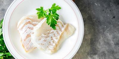 merluzzo pesce bianca filetto fresco pasto cibo merenda su il tavolo copia spazio cibo sfondo foto