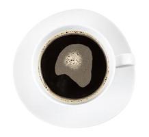 superiore Visualizza di tazza con cicoria radice tè su piattino foto