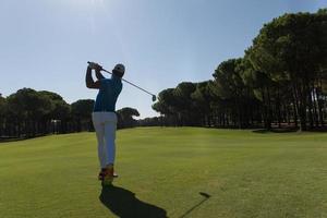 golf giocatore colpire tiro foto