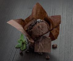 cioccolato focaccina su di legno sfondo foto