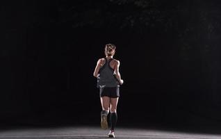 femmina corridore formazione per maratona foto