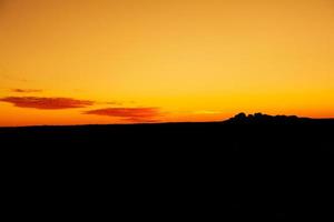 tramonto roccia formazione sfondo foto