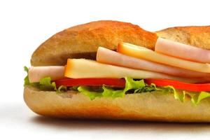 Sandwich su un' bianca superficie foto