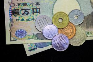 giapponese yen, moneta, i soldi foto