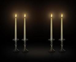 a lume di candela su un candeliere su sfondo nero foto