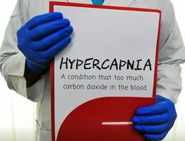 ipercapnia, un' condizione quello pure tanto carbonio biossido nel sangue. appunti su medico mano con medico termine ipercapnia. foto