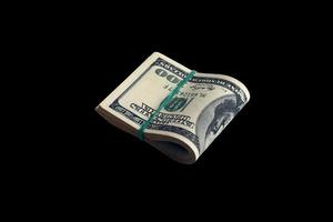 fascio di noi dollaro fatture isolato su nero. imballare di americano i soldi con alto risoluzione su Perfetto nero sfondo foto