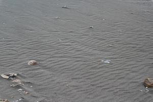 sabbia sulla spiaggia come sfondo foto