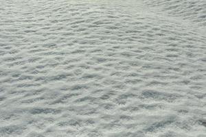 struttura di primavera neve. strato di Ghiaccio. dettagli di inverno natura. foto