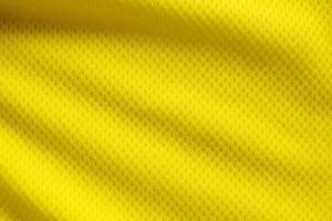 colore giallo maglia da calcio abbigliamento tessuto trama abbigliamento sportivo sfondo, primo piano foto