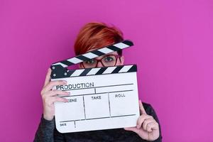 donna Tenere film battacchio isolato su rosa sfondo foto