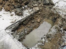 scavando strade, posa acqua tubi foto