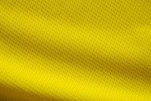 colore giallo maglia da calcio abbigliamento tessuto trama abbigliamento sportivo sfondo, primo piano foto