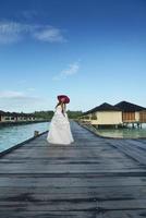 asiatico sposa su spiaggia foto