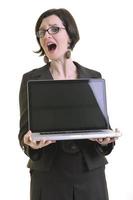 attività commerciale donna Lavorando su il computer portatile isolato su bianca foto