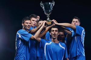 calciatori che celebrano la vittoria foto