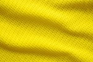 colore giallo maglia da calcio abbigliamento tessuto trama abbigliamento sportivo sfondo, primo piano foto