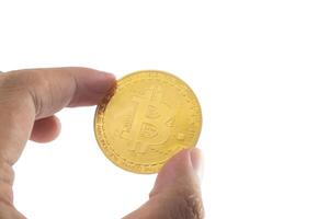 bitcoin Tenere nel mano isolato su bianca sfondo con ritaglio sentiero. foto