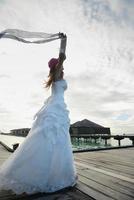 asiatico sposa su spiaggia foto