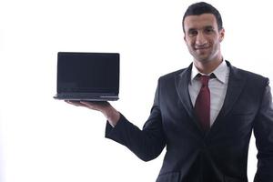 attività commerciale uomo opera su mini il computer portatile foto