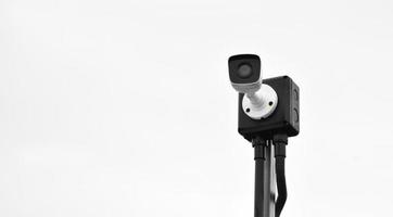 mini ip cctv telecamera installato su di legno polo per fare il sicurezza anziché di umano di monitoraggio attraverso mobile Telefono, morbido e selettivo messa a fuoco. foto