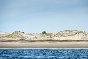 dune di sabbia sulla spiaggia foto