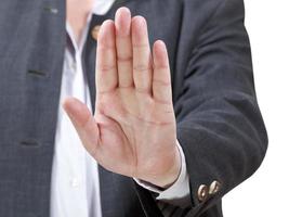 fermare cartello di Aperto palma - uomo d'affari mano gesto foto